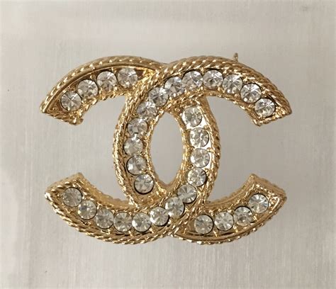 chanel leather and rhinestone brooch|chanel brooches near me.